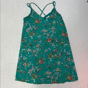 green dress with floral pattern